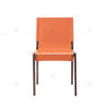 Orange saddle leather armless dining chairs